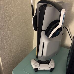 PlayStation 5 with headset and controller